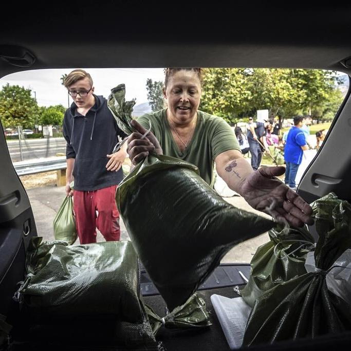 Rain from Tropical Storm Hilary lashes California and Mexico, swamping roads and trapping cars